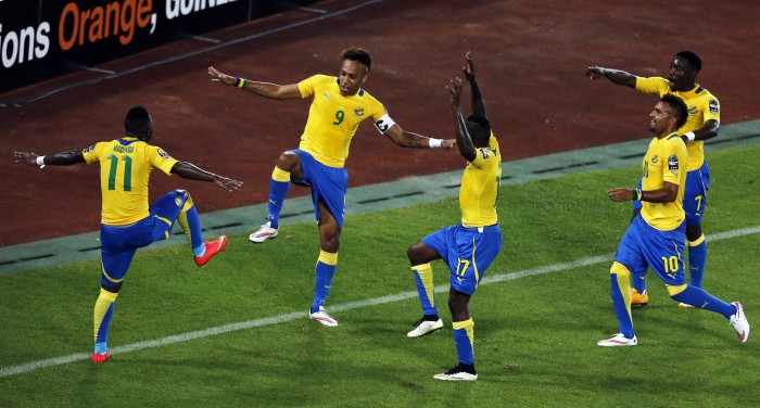 Aubameyang of Gabon celebrates his goal with his team mates after scoring against Burkina Faso during the 2015 African Cup of Nations soccer tournament Group A at Bata Stadium, in Bata